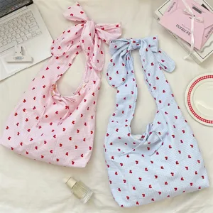 Cute Japanese style ribbon bow shoulder bag, pink and blue plaid crossbody bag detail.