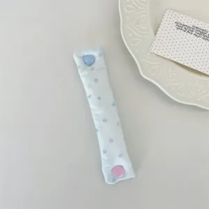 Cute blue star fabric earphone cord organizer strap with heart and round snap buttons.