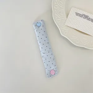 Cute heart snap cord organizer strap for neat earphone and data cable management daily.
