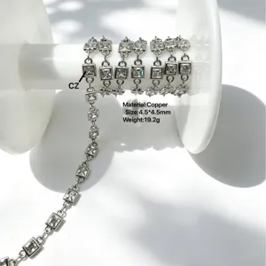 Square bezel-set cubic zirconia copper chain spool for DIY handmade jewelry crafting.