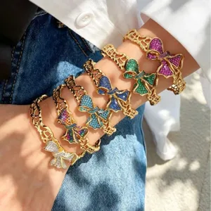 Vintage Vergoldetes Kupfer Hohl Schleife Schmuckset Mit Farbigem Zirkonia Offen Verstellbarer Ring Und Armreif Für Damen