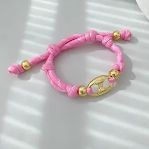 Rosa geflochtenes Seil Armband mit Gold Metall Schweinsnase Charme Mode DIY Schmuck