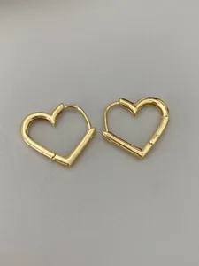 Elegant gold bamboo heart huggie hoop earrings for women, minimalist daily commuter jewelry.