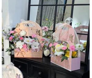 Handheld floral gift box packaging for DIY flower arrangements, perfect for teachers day.
