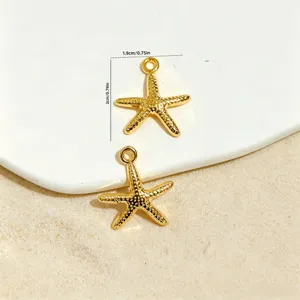 Macro view of gold starfish charms with dimension labels for DIY jewelry making