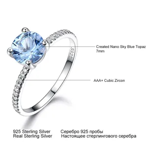 Atemberaubender 925 Sterling Silber Ring mit 7mm hellblauem Topas und funkelnden Zirkonias.