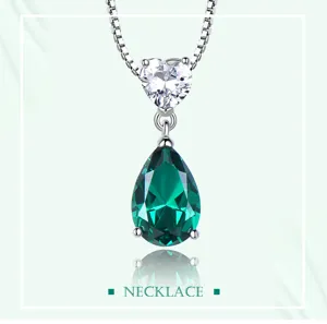 Elegante 925 Silber Halskette mit Herz Zirkon und atemberaubendem gruenem Kristall Anhaenger.
