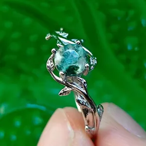 Silver moss agate ring with delicate vine and leaf design, ideal for nature lovers and daily wear.