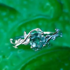 Silver moss agate ring with delicate vine leaf design, elegant botanical style sterling jewelry.