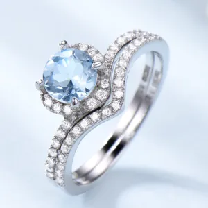 Atemberaubender 925 Silber hellblauer Topas Ring mit edlem Zirkon geschwungenen Band.