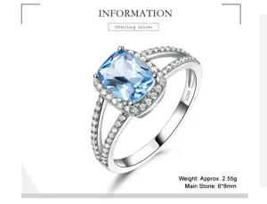 Atemberaubender Sterlingsilber Ring mit blauem Topas Hauptstein und funkelnden Zirkoniasteinen.