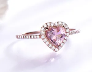 Silberner Ring mit rosafarbenem Herzstein und funkelnden Zirkoniasteinen für Damen.