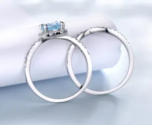 Atemberaubendes 925 Silber hellblaues Topas Ring Set Detailbild mit feinem Halo Design.