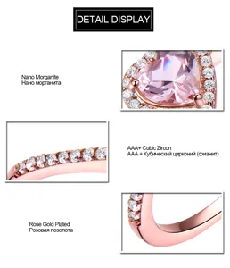 Details des silbernen Nano Morganit Rings mit Herz Zirkonia Steinen in Roségold.