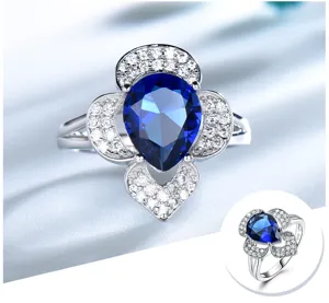 Stunning 925 sterling silver pear blue sapphire floral ring with sparkling pavé cubic zirconia.