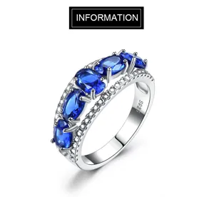 Luxus 925 Sterling Silber Ring mit ovalem blauen Saphir und glitzernden Pave Zirkonia Steinen.