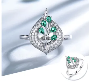 Exquisiter 925er Silber Blattring mit funkelnden Zirkonia und grünen Edelsteinen.