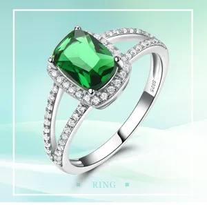 S925 Silber Smaragdschliff grüner synthetischer Edelstein Ring mit Zirkon Verzier.