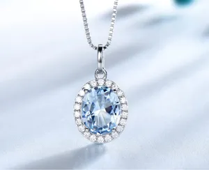 Silber Ovale Hellblaue Topas Halo Anhänger Halskette Elegantes Damenschmuck Geschenk