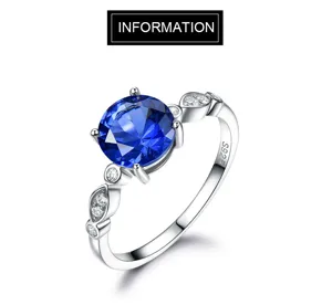 Eleganter 925 Silber Ring mit blauem Zirkoniastein und funkelnden kleinen Steinen als Detail.