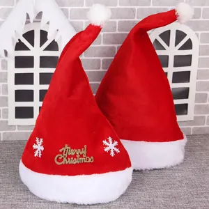 Thickened plush Christmas hat with white pom-pom and gold Merry Christmas decoration.