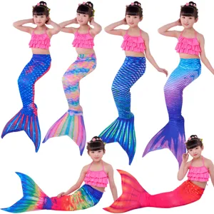 Kids mermaid swimsuit detail, colorful scale bikini set and tail for swimming fun and cosplay.