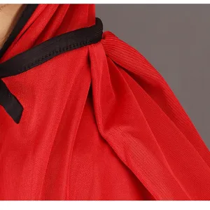 Close-up detail of Halloween black and red cape cloak costume fabric and neckline design.
