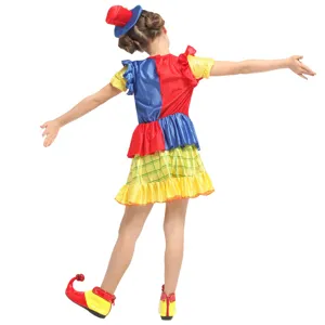 Kids clown costume detail view, featuring colorful patchwork design, matching hat and funny shoes.