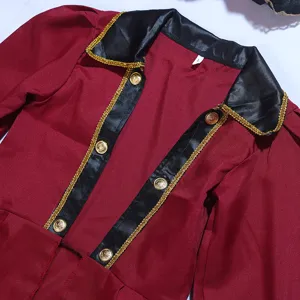 Detailed close-up of pirate costume top, black satin lapel, gold trim, metallic buttons.