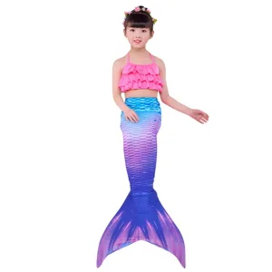 Kids mermaid swimsuit set with pink bikini top and gradient blue fish tail for swimming.