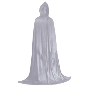 Detail view of a soft hooded velvet cape, showcasing texture and long flowing hemline.