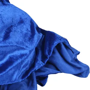 Blue velvet Halloween cloak cape fabric close-up detail shot, soft texture and smooth sheen.