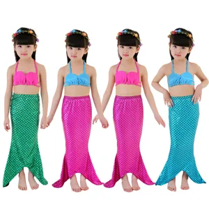 Kids mermaid swimsuit set with shell bikini top and sparkly tail skirt for girls.