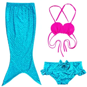 Details of kids mermaid swimsuit set, featuring shimmering scale tail, seashell bikini top.