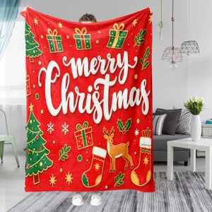 Cozy red Christmas flannel blanket with festive holiday prints, perfect for winter warm nap.