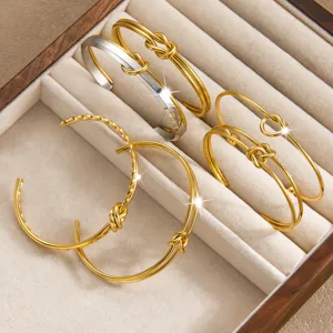 Titanstahl Knoten Armreif, PVD 18k vergoldet, minimalistische Mode offene Armbänder.