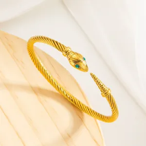 Bracelet manchette serpent or punk acier titane geometrique fil tordu bijou femme elegant