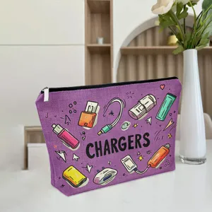 Detail view of purple canvas charger storage pouch with cute doodle pattern and zipper.
