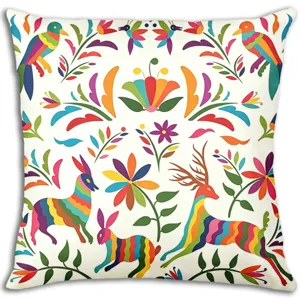 Close-up detail of Mexican Otomi style colorful printed cushion cover with vibrant animal patterns.