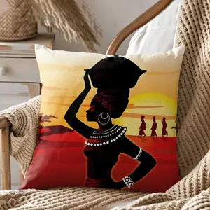 Close-up of African tribal ethnic style pillowcase with sunset silhouette design on textured chair.