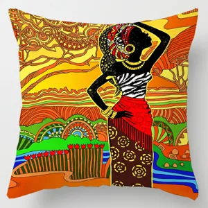 Close-up detail of vibrant African tribal art print throw pillow cover with geometric patterns.
