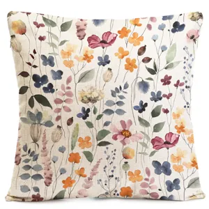 Watercolor floral pillow cover detail, botanical print cushion case, soft linen texture.