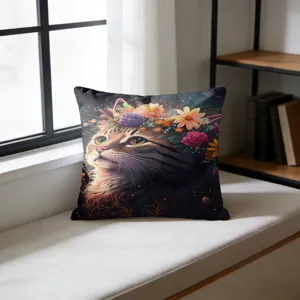 Detail view of decorative square throw pillow with floral cat print in a cozy home setting.