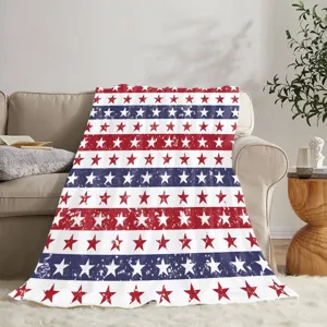 Couverture en flanelle thème drapeau américain avec étoiles et rayures vintage pour fête nationale.