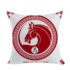 Close-up detail of the decorative square pillow cover featuring a Chinese horse year red print.