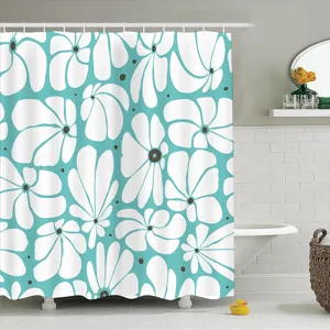 Detail van douchegordijn met moderne bloemenprint, turquoise en wit abstract bloemenpatroon badkamer.