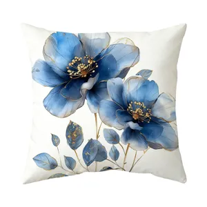 Blue watercolor floral throw pillow cover with gold accent details for elegant living room decor.