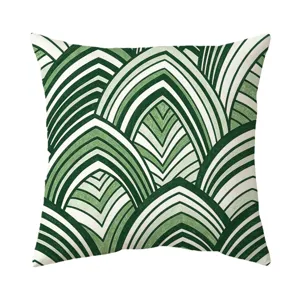 Housse de coussin de style nordique avec motif de feuilles tropicales geometriques.