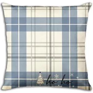 Detailed view of Nordic blue plaid Christmas throw pillow cover with cute tree and holiday text.