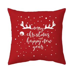 Red Christmas throw pillow cover detail, festive reindeer antlers and snowflakes design.